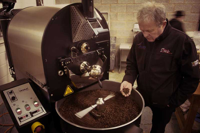 Mr Monsoon inspects the roast from our first Probat